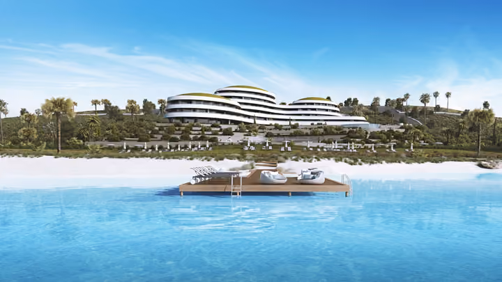 Architectural visualization from the sea showing the pier and buildings behind it.