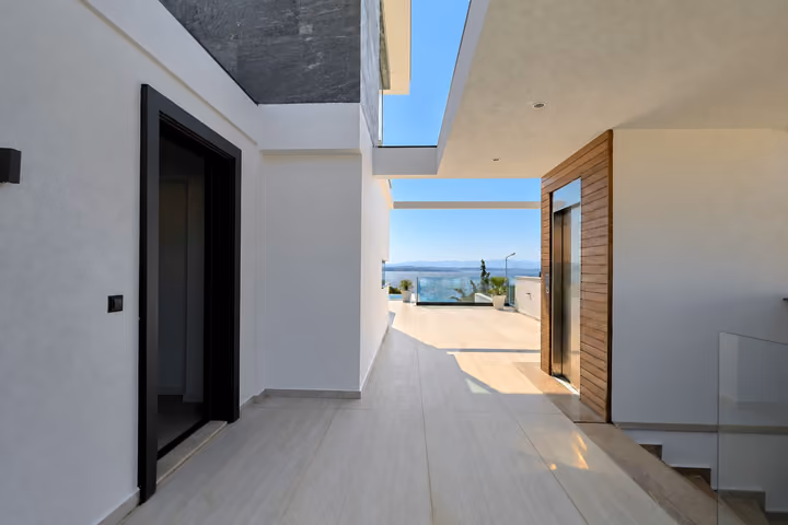 Wood Clad Lift Terrace at the detached villa in Ardıç, Çeşme.