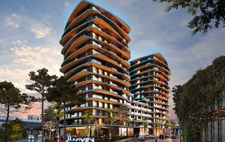 Architectural rendering of residential towers viewed from street level.