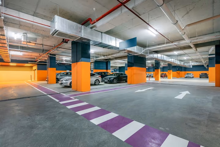 Photograph of underground parking garage.