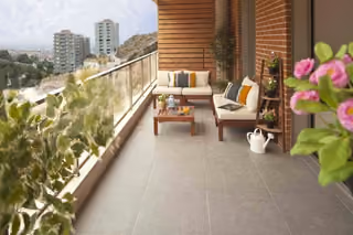 Covered balcony facing the residential gardens.