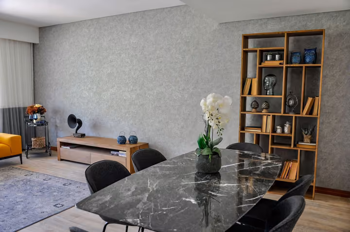 Living and dining area with modern furniture.