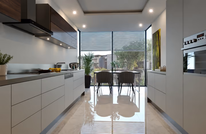 Interior view showing separate kitchen with dining area beside the window in Gaziemir, Izmir.