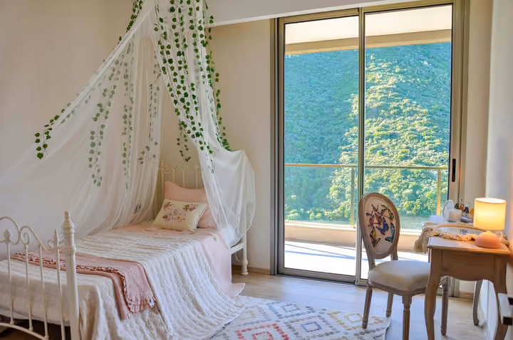 Bright bedroom with garden access.