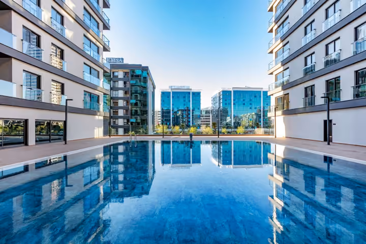 Photograph of outdoor courtyard swimming pool.