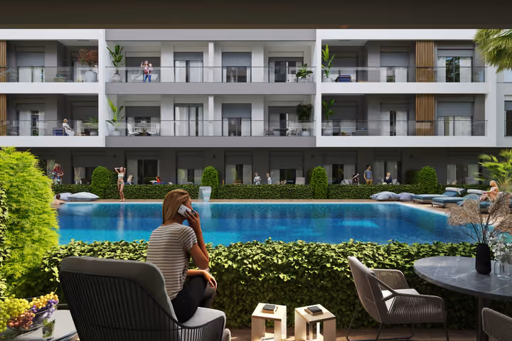 Architectural visualization of poolside seating and balconies facing the shared courtyard.