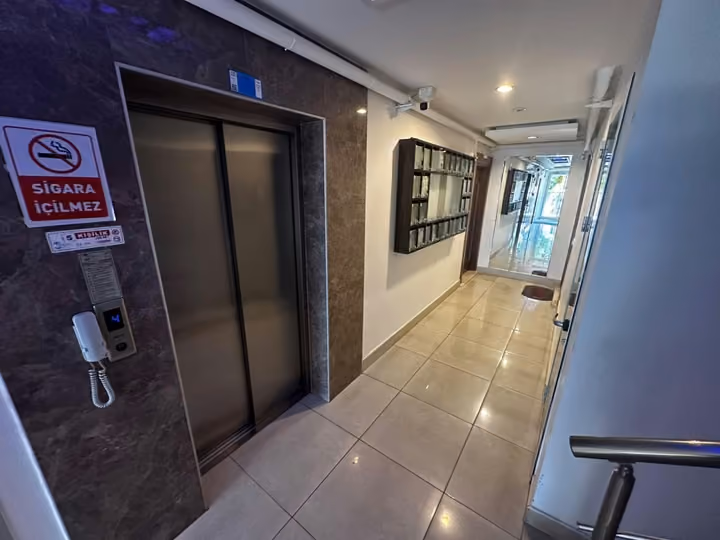 Liman shared elevator corridor