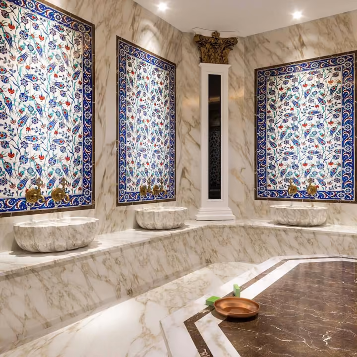 Rendering of marble basins and tiled walls in the Turkish bath