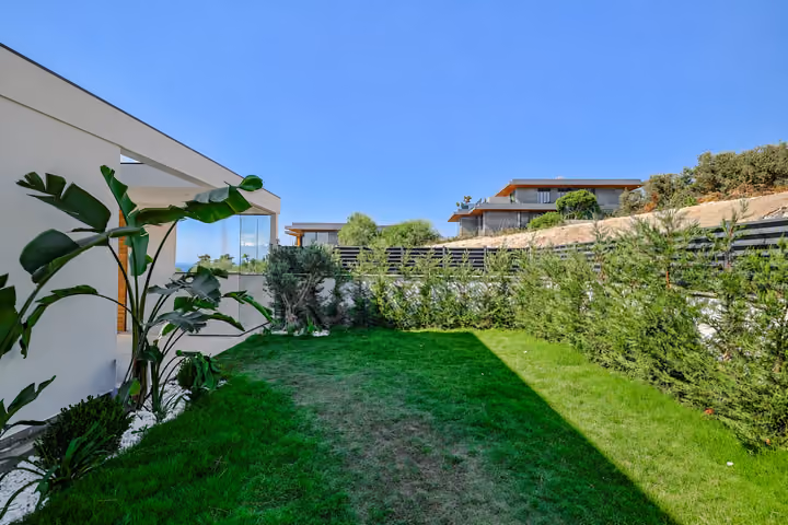 Side Garden Lawn at the detached villa in Ardıç, Çeşme.