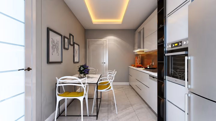 Interior rendering showing kitchen cabinetry, built in appliances and a dining table.