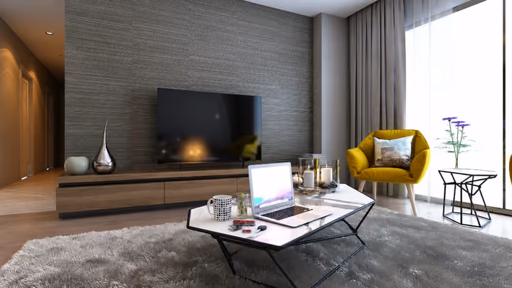 Interior rendering showing a television wall, coffee table and seating beside a window.