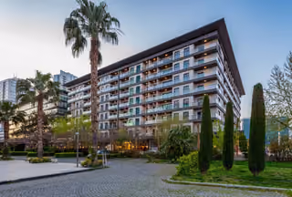 Photograph of landscaped pedestrian area beside the residences.