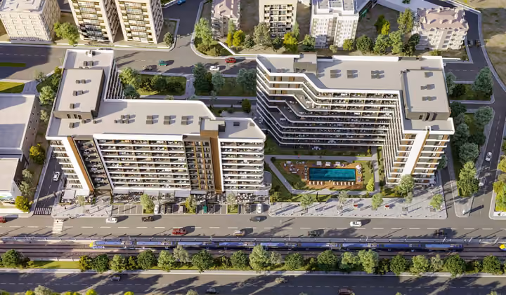 Architectural visualization looking down over the residential blocks, pools and adjoining streets.