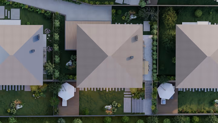 A close overhead view of villa roofs, private garden areas and paths. Architectural render supplied in the project source folder; it illustrates the proposed design.