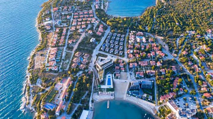 Wide aerial view of the coastal neighborhood.