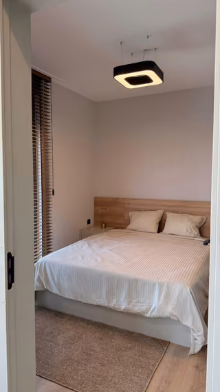 Bedroom in the sample apartment shown by the developer.