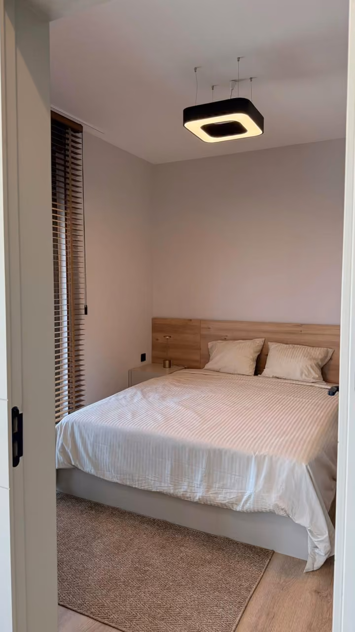 Bedroom in the sample apartment shown by the developer.