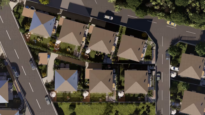An overhead view of several villa plots and intersecting internal roads. Architectural render supplied in the project source folder; it illustrates the proposed design.