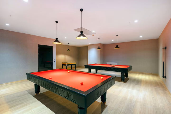 Photograph of billiards and table-tennis room.