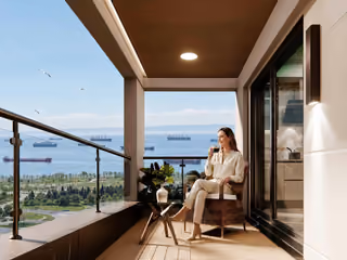 Architectural rendering of a furnished apartment balcony with glass balustrades and a sea view.
