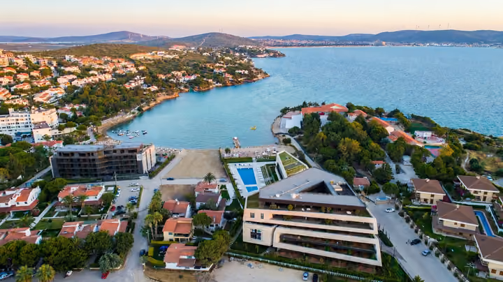 Bay and residential complex from above.