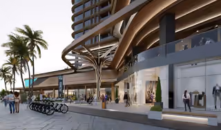Architectural visualization of the pedestrian frontage and commercial units below the tower.
