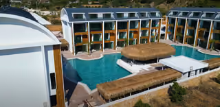 Aerial view of the residential blocks and shared pool courtyard