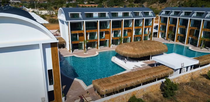 Aerial view of the residential blocks and shared pool courtyard