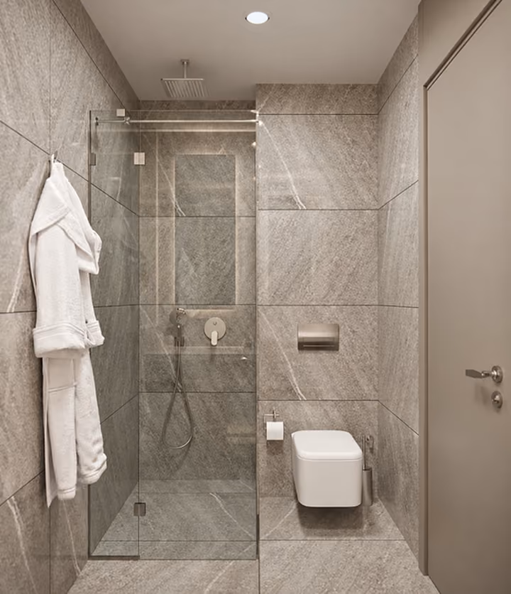 Interior visualization showing the shower enclosure and wall-mounted toilet in a tiled bathroom.