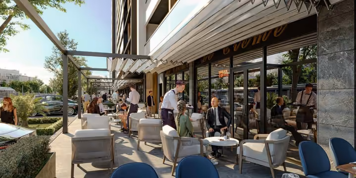 Architectural visualization of cafe tables and planted seating areas along the commercial frontage.