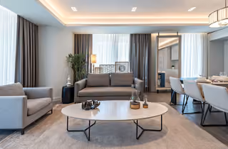 Living room with adjacent dining area.