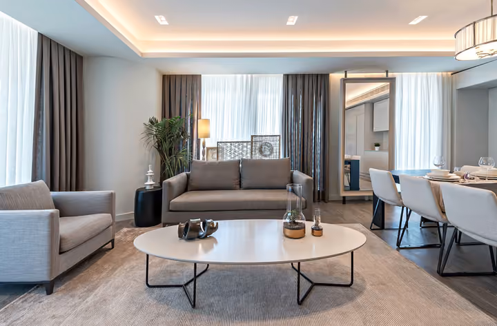 Living room with adjacent dining area.