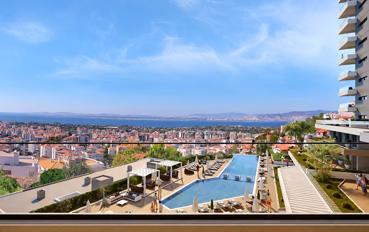 A landscaped pool terrace and residential balconies overlooking Izmir Bay from Narlidere.