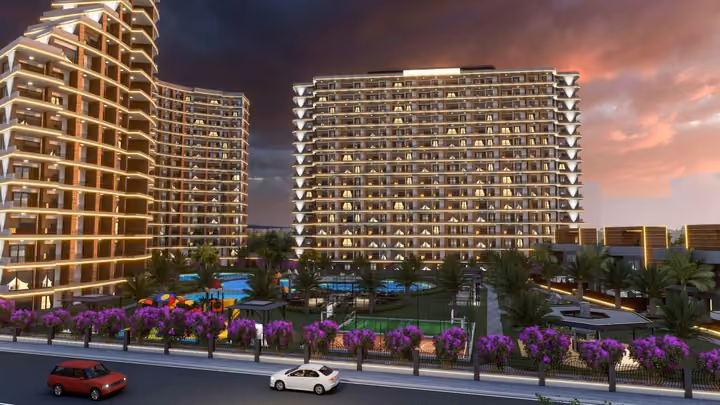Architectural rendering of the residential complex and landscaped outdoor facilities at dusk.