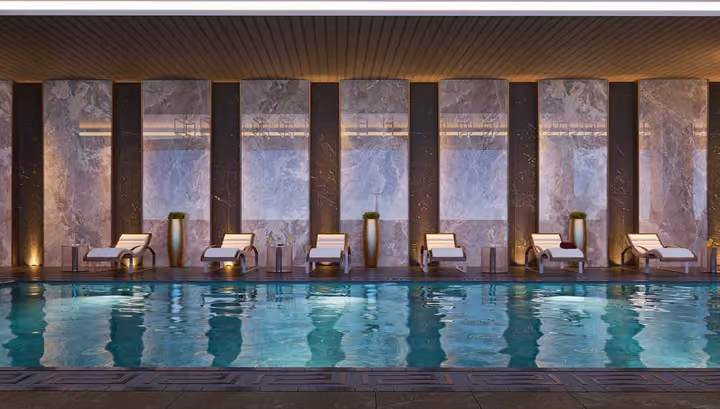 Developer interior visualization of the enclosed swimming pool and relaxation area.