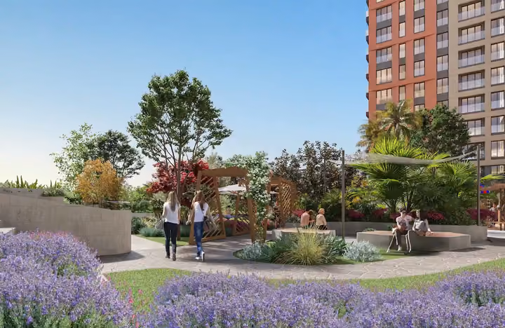 Architectural rendering of a landscaped walking path and pergola beside apartment blocks in Topkapi