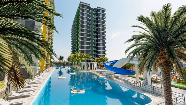 Architectural visualisation of the apartment buildings, outdoor pool and water slides.