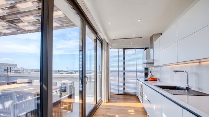 Bright fitted kitchen with glazed terrace doors in Boyalik, Cesme.