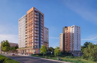 Street-side architectural rendering of apartment towers with ground-floor commercial spaces in Topkapi
