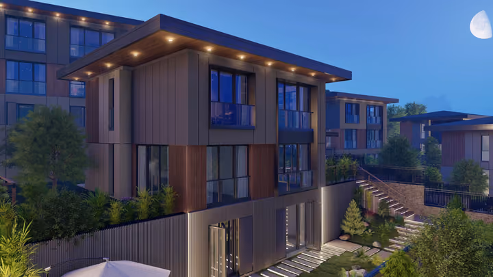 An illuminated villa facade and outdoor steps in a night scene. Architectural render supplied in the project source folder; it illustrates the proposed design.