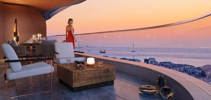 Developer visualization of a furnished terrace with a glass balustrade and distant bay view.