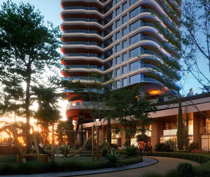 Architectural visualization of the tower rising above trees and the garden frontage.