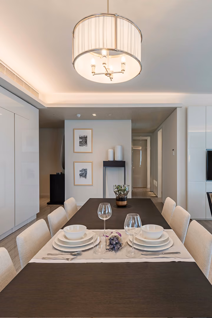 Dining area inside a furnished apartment.