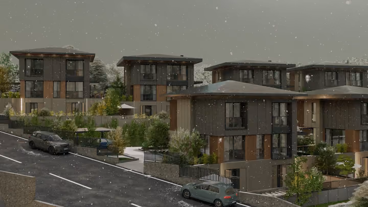 A group of hillside villas and roads illustrated during snowfall. Architectural render supplied in the project source folder; it illustrates the proposed design.