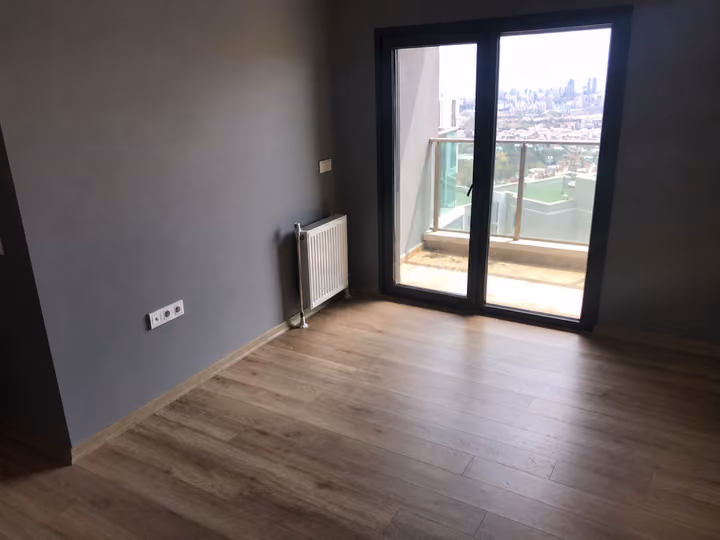 Bedroom with a balcony door.