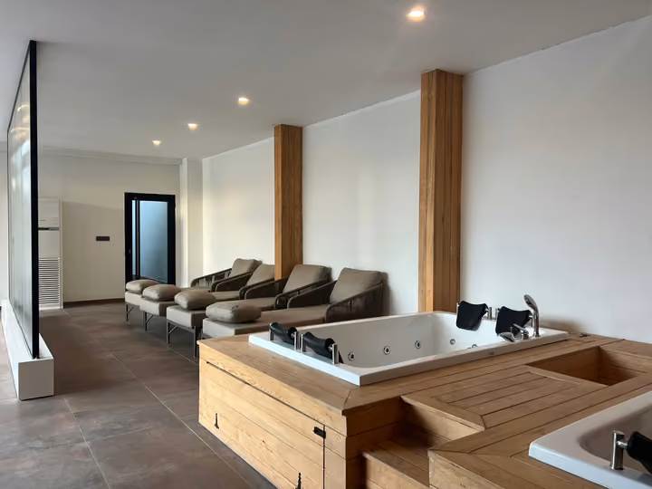 Shared lounge with seating and a table game