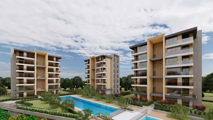 Architectural visualisation of apartment buildings around the landscaped outdoor pool in Lara.