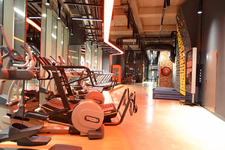 Fitness centre with cardio equipment.
