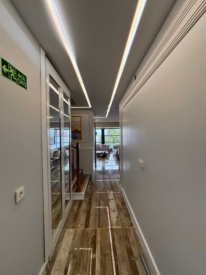 Interior hallway leading towards the living room.