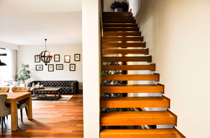 Timber staircase inside a duplex residence.